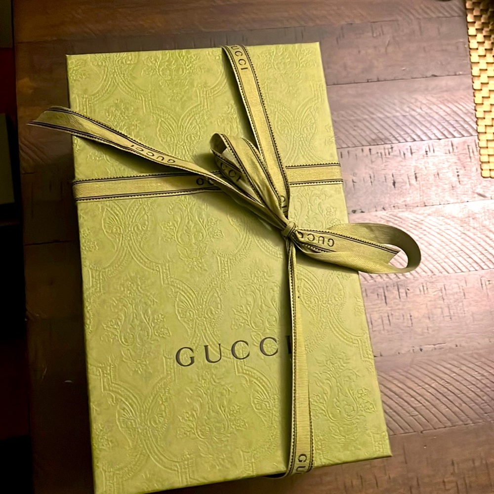 Empty Gucci box with ribbon